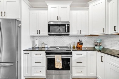 Discover the charm of this custom-built Craftsman home at Mt on Mountain Aire Golf Course in North Carolina - for sale on GolfHomes.com, golf home, golf lot