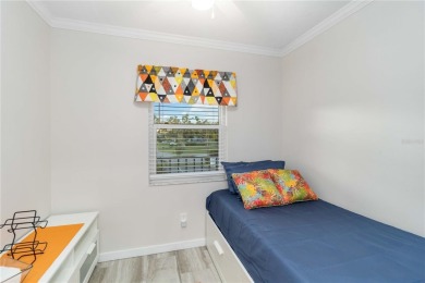 Enjoy peaceful unobstructed views of the lake and golf course on Palm Aire Country Club of Sarasota in Florida - for sale on GolfHomes.com, golf home, golf lot