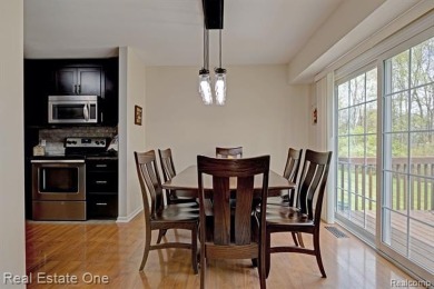 Beautiful End Unit Ranch Condo in Desirable Golf Community! on The Captains Club At Woodfield in Michigan - for sale on GolfHomes.com, golf home, golf lot
