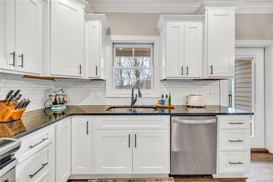 Discover the charm of this custom-built Craftsman home at Mt on Mountain Aire Golf Course in North Carolina - for sale on GolfHomes.com, golf home, golf lot