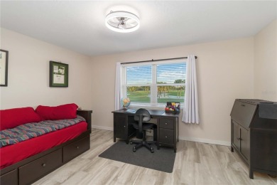 Enjoy peaceful unobstructed views of the lake and golf course on Palm Aire Country Club of Sarasota in Florida - for sale on GolfHomes.com, golf home, golf lot
