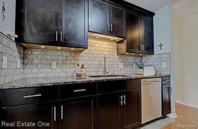 Beautiful End Unit Ranch Condo in Desirable Golf Community! on The Captains Club At Woodfield in Michigan - for sale on GolfHomes.com, golf home, golf lot