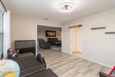 Enjoy peaceful unobstructed views of the lake and golf course on Palm Aire Country Club of Sarasota in Florida - for sale on GolfHomes.com, golf home, golf lot
