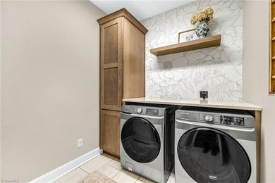 Discover the charm of this custom-built Craftsman home at Mt on Mountain Aire Golf Course in North Carolina - for sale on GolfHomes.com, golf home, golf lot