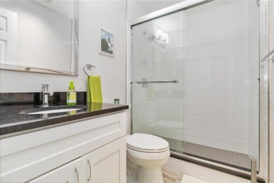Enjoy peaceful unobstructed views of the lake and golf course on Palm Aire Country Club of Sarasota in Florida - for sale on GolfHomes.com, golf home, golf lot