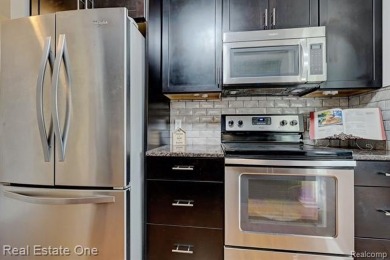 Beautiful End Unit Ranch Condo in Desirable Golf Community! on The Captains Club At Woodfield in Michigan - for sale on GolfHomes.com, golf home, golf lot