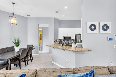 Spacious 3-bedroom, 2-bathroom home offering peaceful golf on St. Lucie Trail Golf Club in Florida - for sale on GolfHomes.com, golf home, golf lot