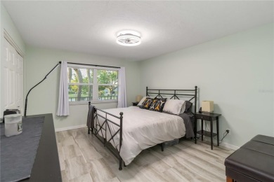 Enjoy peaceful unobstructed views of the lake and golf course on Palm Aire Country Club of Sarasota in Florida - for sale on GolfHomes.com, golf home, golf lot