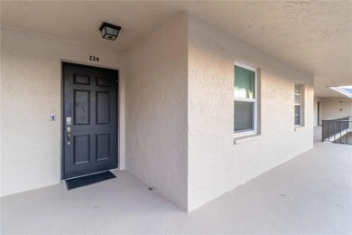 Enjoy peaceful unobstructed views of the lake and golf course on Palm Aire Country Club of Sarasota in Florida - for sale on GolfHomes.com, golf home, golf lot