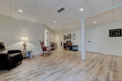 Beautiful End Unit Ranch Condo in Desirable Golf Community! on The Captains Club At Woodfield in Michigan - for sale on GolfHomes.com, golf home, golf lot