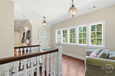 Tucked within this exclusive community, this 4-bed, 4-full & on The Ford Field and River Club  in Georgia - for sale on GolfHomes.com, golf home, golf lot