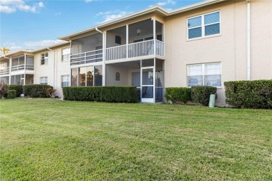 Enjoy peaceful unobstructed views of the lake and golf course on Palm Aire Country Club of Sarasota in Florida - for sale on GolfHomes.com, golf home, golf lot