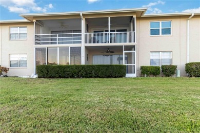 Enjoy peaceful unobstructed views of the lake and golf course on Palm Aire Country Club of Sarasota in Florida - for sale on GolfHomes.com, golf home, golf lot