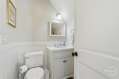 Tucked within this exclusive community, this 4-bed, 4-full & on The Ford Field and River Club  in Georgia - for sale on GolfHomes.com, golf home, golf lot