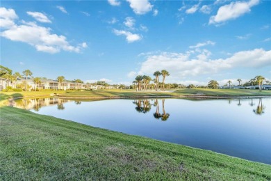 Enjoy peaceful unobstructed views of the lake and golf course on Palm Aire Country Club of Sarasota in Florida - for sale on GolfHomes.com, golf home, golf lot