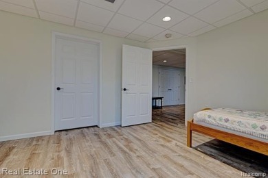 Beautiful End Unit Ranch Condo in Desirable Golf Community! on The Captains Club At Woodfield in Michigan - for sale on GolfHomes.com, golf home, golf lot