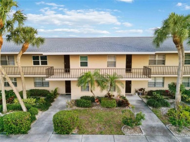 Enjoy peaceful unobstructed views of the lake and golf course on Palm Aire Country Club of Sarasota in Florida - for sale on GolfHomes.com, golf home, golf lot