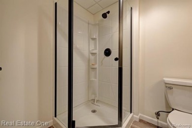 Beautiful End Unit Ranch Condo in Desirable Golf Community! on The Captains Club At Woodfield in Michigan - for sale on GolfHomes.com, golf home, golf lot