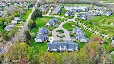 Beautiful End Unit Ranch Condo in Desirable Golf Community! on The Captains Club At Woodfield in Michigan - for sale on GolfHomes.com, golf home, golf lot