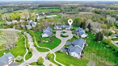 Beautiful End Unit Ranch Condo in Desirable Golf Community! on The Captains Club At Woodfield in Michigan - for sale on GolfHomes.com, golf home, golf lot