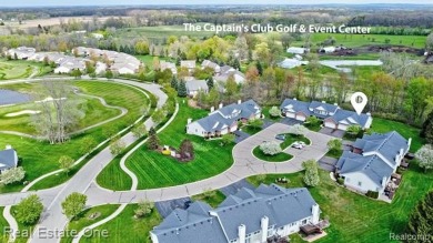 Beautiful End Unit Ranch Condo in Desirable Golf Community! on The Captains Club At Woodfield in Michigan - for sale on GolfHomes.com, golf home, golf lot