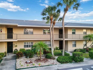 Enjoy peaceful unobstructed views of the lake and golf course on Palm Aire Country Club of Sarasota in Florida - for sale on GolfHomes.com, golf home, golf lot