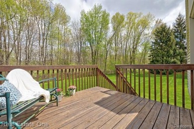 Beautiful End Unit Ranch Condo in Desirable Golf Community! on The Captains Club At Woodfield in Michigan - for sale on GolfHomes.com, golf home, golf lot