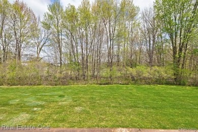 Beautiful End Unit Ranch Condo in Desirable Golf Community! on The Captains Club At Woodfield in Michigan - for sale on GolfHomes.com, golf home, golf lot