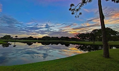 Enjoy peaceful unobstructed views of the lake and golf course on Palm Aire Country Club of Sarasota in Florida - for sale on GolfHomes.com, golf home, golf lot