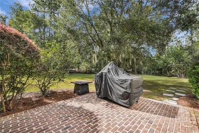 Tucked within this exclusive community, this 4-bed, 4-full & on The Ford Field and River Club  in Georgia - for sale on GolfHomes.com, golf home, golf lot