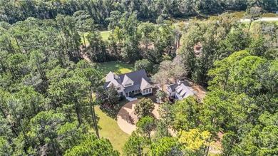 Tucked within this exclusive community, this 4-bed, 4-full & on The Ford Field and River Club  in Georgia - for sale on GolfHomes.com, golf home, golf lot