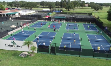 Enjoy peaceful unobstructed views of the lake and golf course on Palm Aire Country Club of Sarasota in Florida - for sale on GolfHomes.com, golf home, golf lot