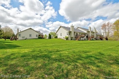 Beautiful End Unit Ranch Condo in Desirable Golf Community! on The Captains Club At Woodfield in Michigan - for sale on GolfHomes.com, golf home, golf lot