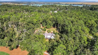 Tucked within this exclusive community, this 4-bed, 4-full & on The Ford Field and River Club  in Georgia - for sale on GolfHomes.com, golf home, golf lot