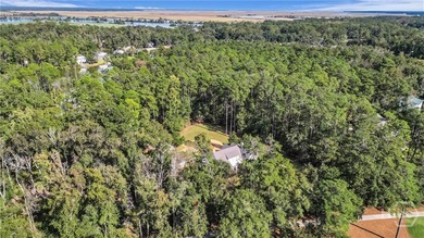 Tucked within this exclusive community, this 4-bed, 4-full & on The Ford Field and River Club  in Georgia - for sale on GolfHomes.com, golf home, golf lot