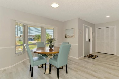 MUST SEE!  SPLIT BEDROOM PLAN!  DOUBLE LOT!  UPDATED!  HEATED on Oyster Creek Golf Club in Florida - for sale on GolfHomes.com, golf home, golf lot