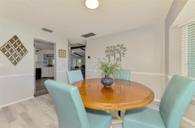 MUST SEE!  SPLIT BEDROOM PLAN!  DOUBLE LOT!  UPDATED!  HEATED on Oyster Creek Golf Club in Florida - for sale on GolfHomes.com, golf home, golf lot