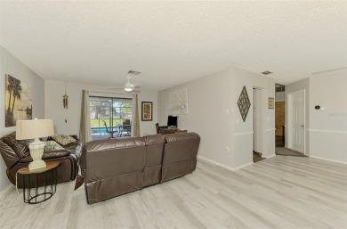 MUST SEE!  SPLIT BEDROOM PLAN!  DOUBLE LOT!  UPDATED!  HEATED on Oyster Creek Golf Club in Florida - for sale on GolfHomes.com, golf home, golf lot