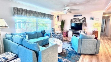 Beautiful WATERFRONT 2BR/2BA home in the desirable 55+ community on Riverbend Golf and Country Club in Florida - for sale on GolfHomes.com, golf home, golf lot