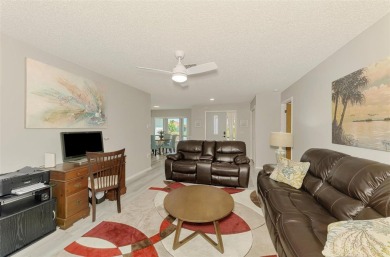MUST SEE!  SPLIT BEDROOM PLAN!  DOUBLE LOT!  UPDATED!  HEATED on Oyster Creek Golf Club in Florida - for sale on GolfHomes.com, golf home, golf lot
