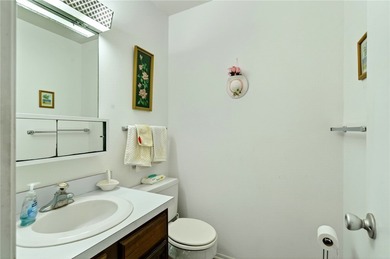 Welcome to effortless Florida living in this beautifully on The American Golf Club in Florida - for sale on GolfHomes.com, golf home, golf lot