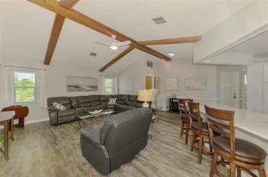 MUST SEE!  SPLIT BEDROOM PLAN!  DOUBLE LOT!  UPDATED!  HEATED on Oyster Creek Golf Club in Florida - for sale on GolfHomes.com, golf home, golf lot
