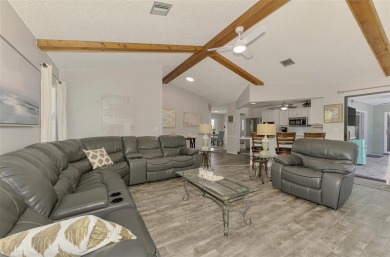 MUST SEE!  SPLIT BEDROOM PLAN!  DOUBLE LOT!  UPDATED!  HEATED on Oyster Creek Golf Club in Florida - for sale on GolfHomes.com, golf home, golf lot
