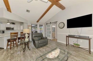 MUST SEE!  SPLIT BEDROOM PLAN!  DOUBLE LOT!  UPDATED!  HEATED on Oyster Creek Golf Club in Florida - for sale on GolfHomes.com, golf home, golf lot