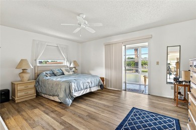 Welcome to effortless Florida living in this beautifully on The American Golf Club in Florida - for sale on GolfHomes.com, golf home, golf lot