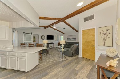 MUST SEE!  SPLIT BEDROOM PLAN!  DOUBLE LOT!  UPDATED!  HEATED on Oyster Creek Golf Club in Florida - for sale on GolfHomes.com, golf home, golf lot