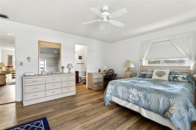 Welcome to effortless Florida living in this beautifully on The American Golf Club in Florida - for sale on GolfHomes.com, golf home, golf lot