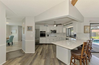 MUST SEE!  SPLIT BEDROOM PLAN!  DOUBLE LOT!  UPDATED!  HEATED on Oyster Creek Golf Club in Florida - for sale on GolfHomes.com, golf home, golf lot