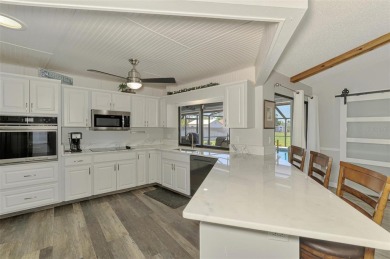 MUST SEE!  SPLIT BEDROOM PLAN!  DOUBLE LOT!  UPDATED!  HEATED on Oyster Creek Golf Club in Florida - for sale on GolfHomes.com, golf home, golf lot