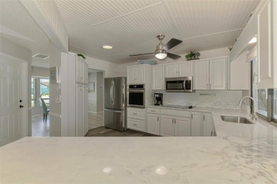 MUST SEE!  SPLIT BEDROOM PLAN!  DOUBLE LOT!  UPDATED!  HEATED on Oyster Creek Golf Club in Florida - for sale on GolfHomes.com, golf home, golf lot